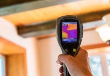 Actis to showcase Part L CPD at LABC’s virtual Welsh roadshow An infrared thermal imaging device is seen in use, close up during an indoor environmental quality and regulation assessment, with copy space.