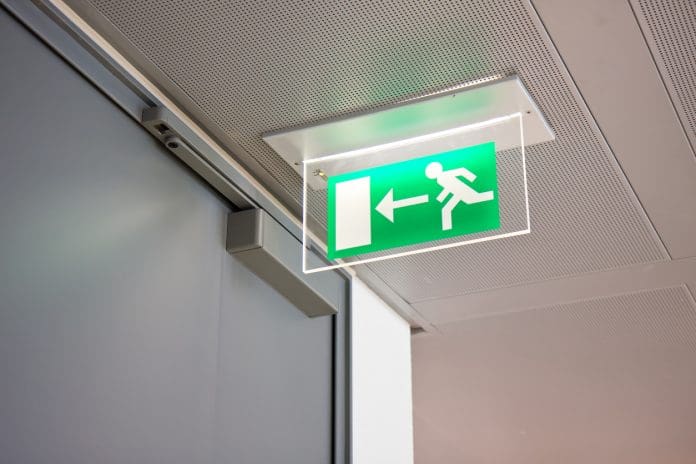 Rutland fire door components achieve SBD’s Police Preferred Specification emergency exit sign in a bulding