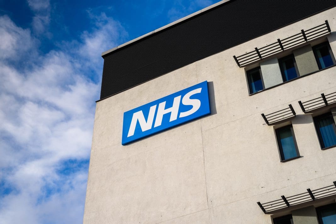 Warrington, United Kingdom - March 6, 2016: Warrington, UK - march 6, 2016: View of the NHS (National Health Service) logo at the Springfields Medical Centre in the centre of Warrington, Cheshire.
