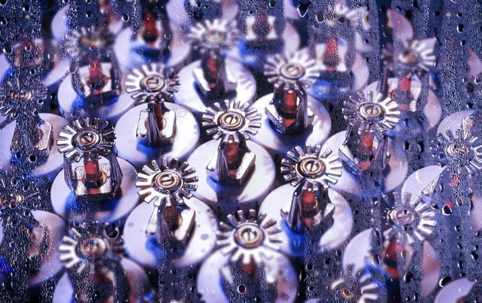 Why fire sprinklers are an essential component of building safety Fire sprinklers in production line