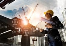 Building the future: Using AI in structural engineering A,Futuristic,Architect,,Businessman,,Industry,4.0.,Engineer,Manager,Using,Tablet