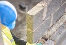 Adopting a diverse local supply chain with The Build Chain installing cavity insulation