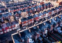 Putting the UK housing market back on track Aerial view of a row of terraced or back to back working class houses during the Winter months with frost on rooftops during the energy and cost of living crisis