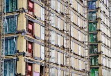 Government review suggests new agency for building remediation High rise residential building of flats with cladding being replaced with fire resistant materials UK