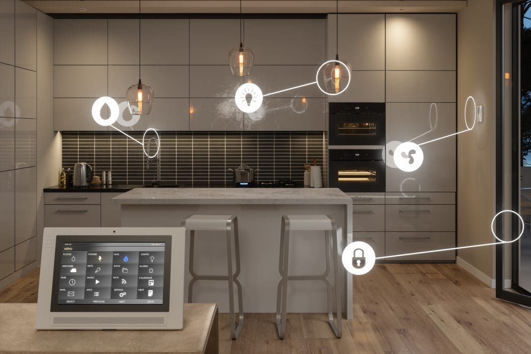 Smart Home Control System With App Icons In Kitchen. Close-up View Of Digital Tablet With Home Automation System On Screen
