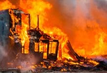 Fire Safety Event demonstrates impact of movement on passive fire protection Burning old wooden house