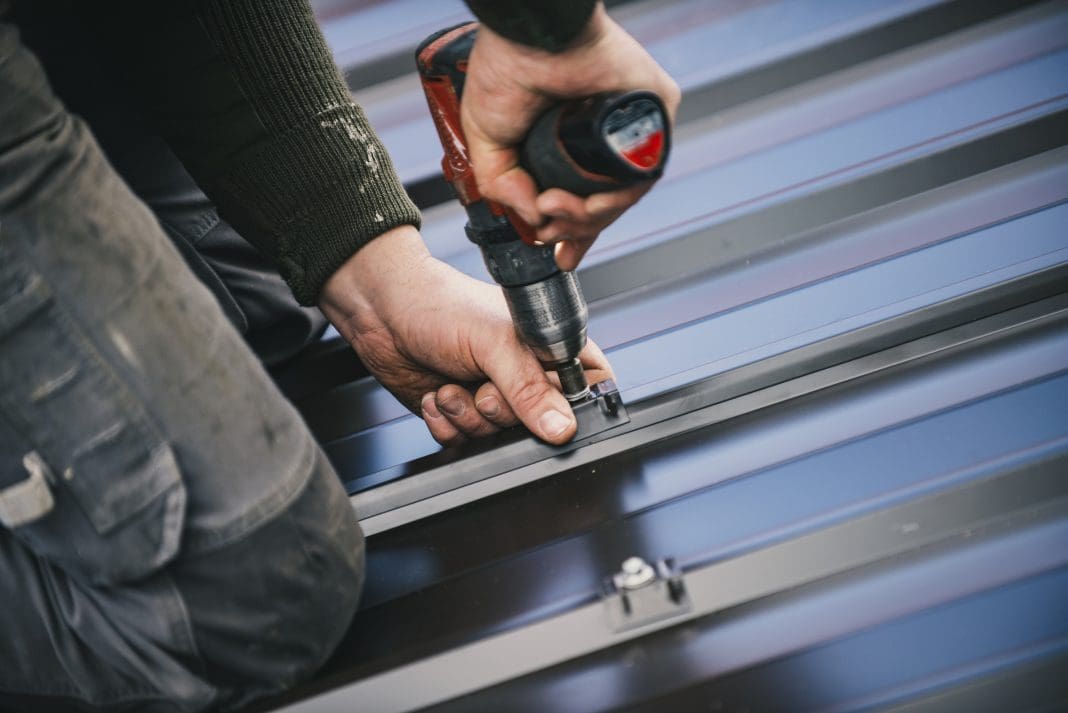 Building contractor is installing metal roofing sheets When it comes to engineering, something as small as fixings can often be the most vital part of the biggest projects, as Dr Alastair Soane, principal consultant of CROSS-UK, and Fellow of Institution of Structural Engineers (IStructE) explains