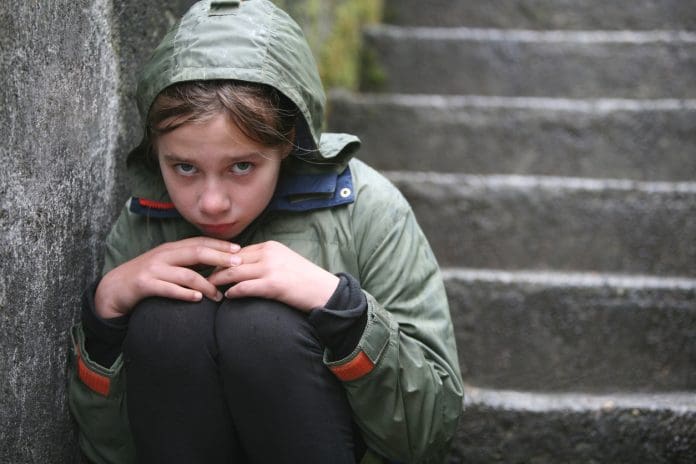 Children in crisis: Confronting the stark reality of England’s housing emergency Forlorn girl representing: Children in crisis: Confronting the stark reality of England’s housing emergency