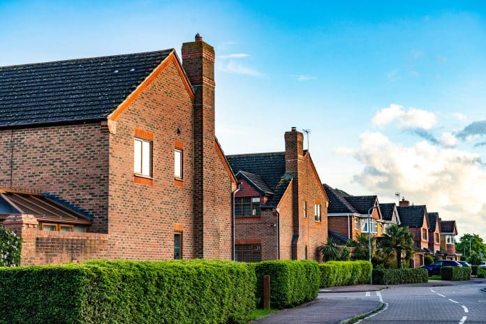 A street on a modern, brick built housing development in the UK