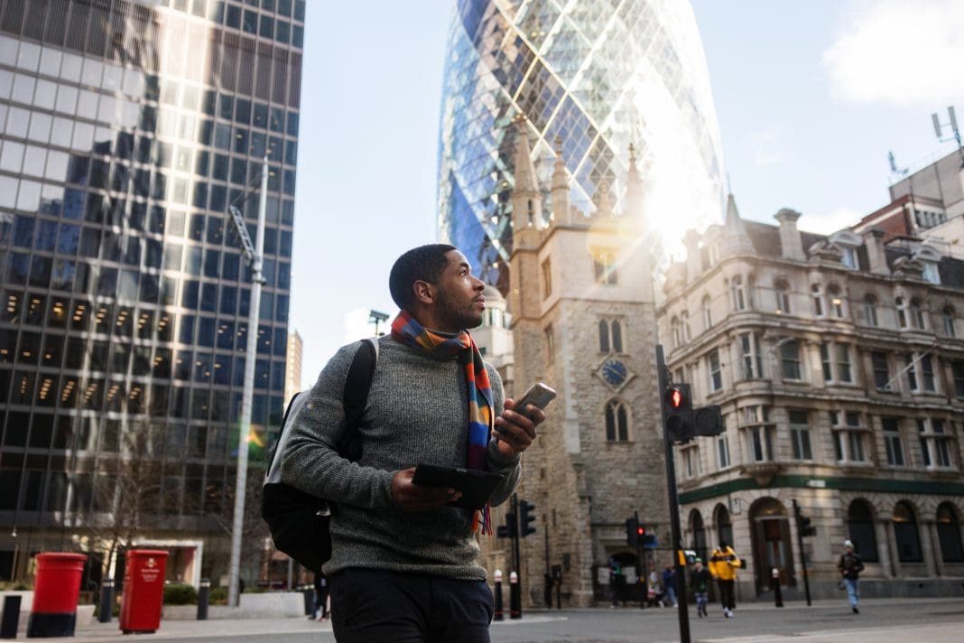 Adult Black Male Admiring The Streets Of London On A Sunny Day While Holding A Smartphone In His Hands Levelling Up project success is still possible, with the right assessment