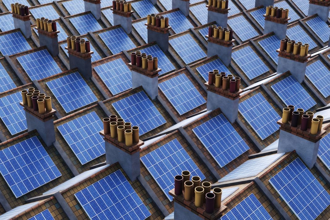 Solar panel installed on rooftops of retro UK houses having classic chimneys. Illustration of the concept of domestic solar energy generation With a new Parliament and sturdy majority, what will Labour do to address the looming deadlines for the clean energy transition?