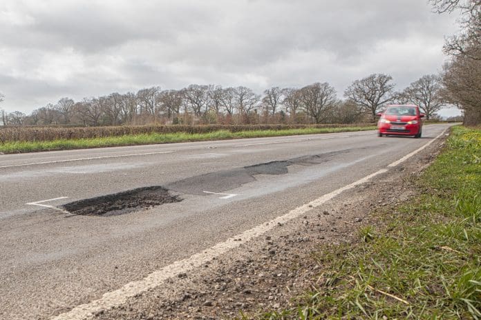 Potholes represent the poor state of England's roads