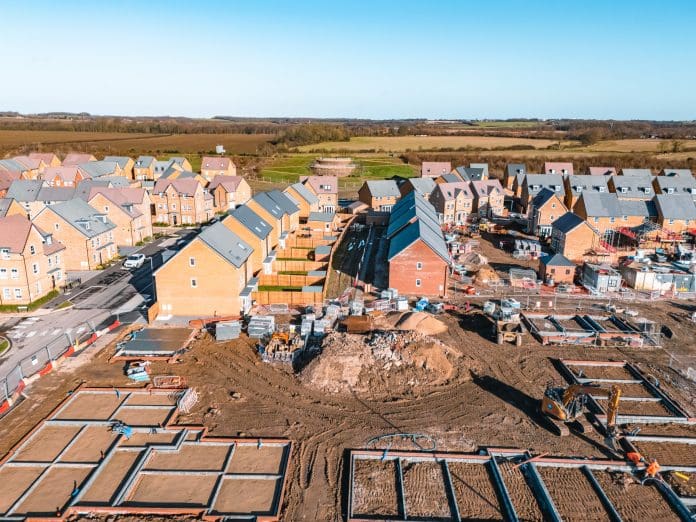 Drone view of new housing development being built in the UK Drone view of new housing development being built in the UK