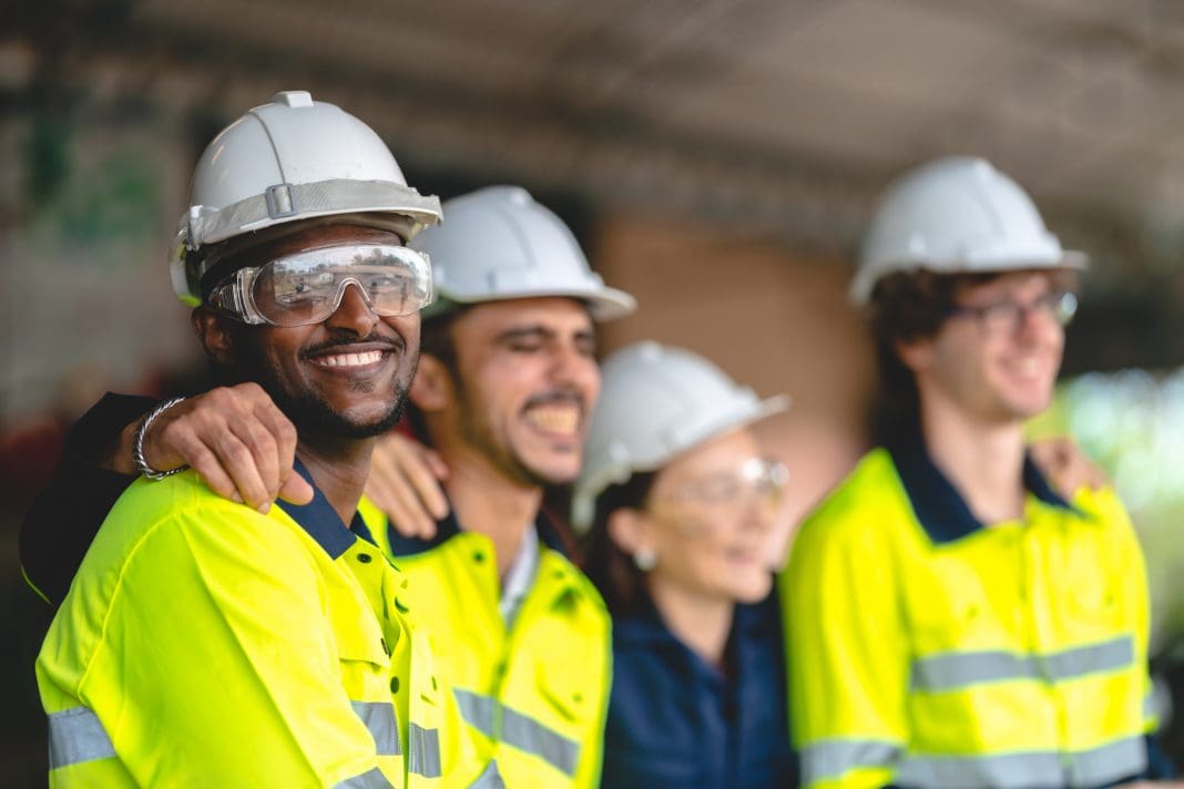 Professional industry engineer and factory foreman worker team person Wearing safety helmet hard hat, Technician people teamwork in work site of business construction and manufacturing technology job The UK construction workforce will need a significant boost, writes Time Barrett