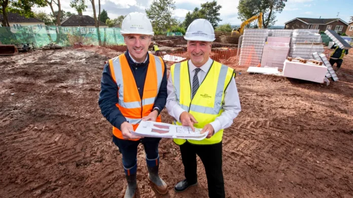 Construction begins on sustainable bungalows in Wolverhampton Chris Timmins, Morro Partnerships managing director, and councillor Steve Evans, City of Wolverhampton council deputy leader and cabinet member for housing, at the site of the new sustainable bungalows