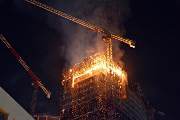 A fire at the Warsaw Hub construction site. Fire in a high-rise building. Fire in a high-rise building construction site