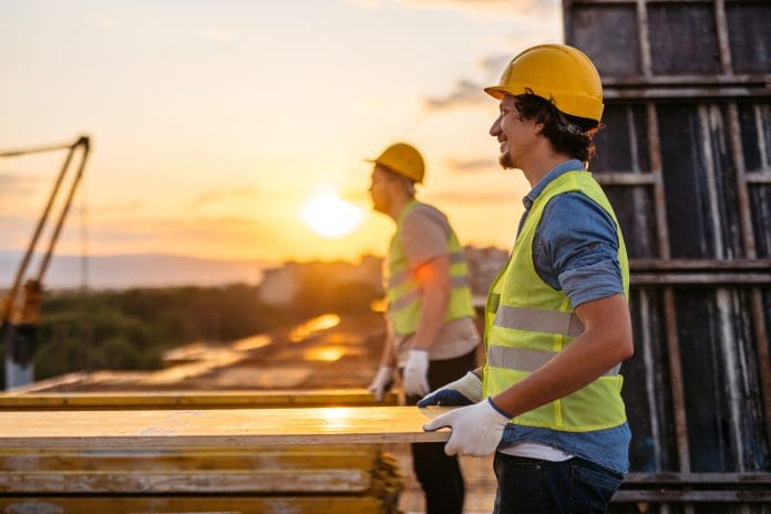 Construction Worker Working On A Construction Site Andrew Devoy examines the changes introduced by the Building Safety Act and explores the impact on design and build processes