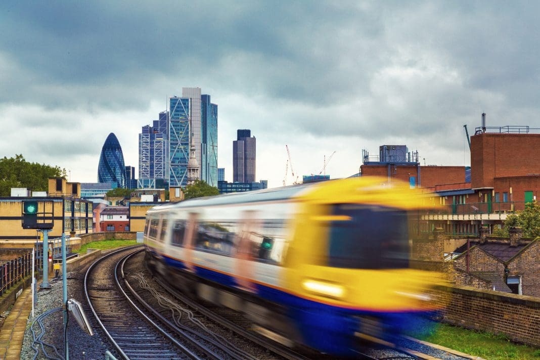London Overground with skyscrapers in the background A change to the debt rule would allow for more efficient investment in construction projects