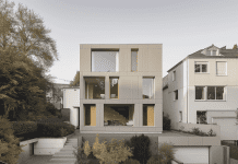 How can robotics and intelligent automation help address the global housing crisis? An AUAR multi-family home built using robotics and intelligence automation.