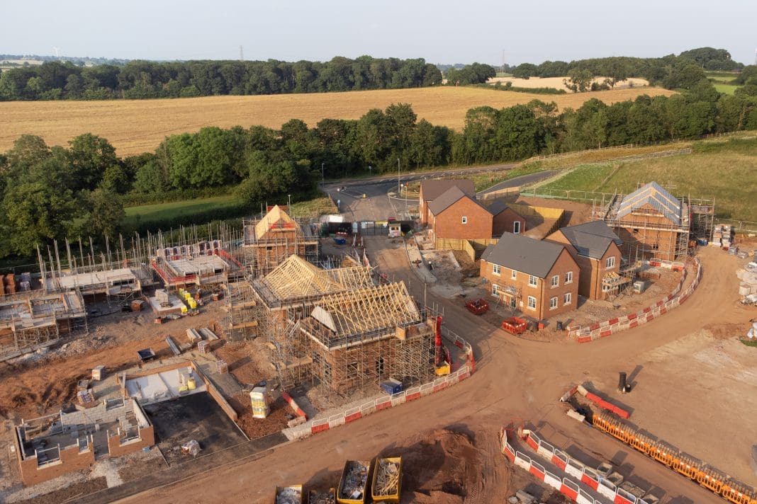 Aerial view of new build housing construction site in England, UK House building has cause for optimism according to the NHBC
