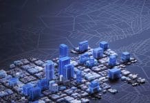 10 years on from Plain Language BIM: Why are we still struggling? Top view of a city business district with 3D buildings, illuminated by white and blue glowing lights. 10 years on from Plain Language BIM: Why are we still struggling?