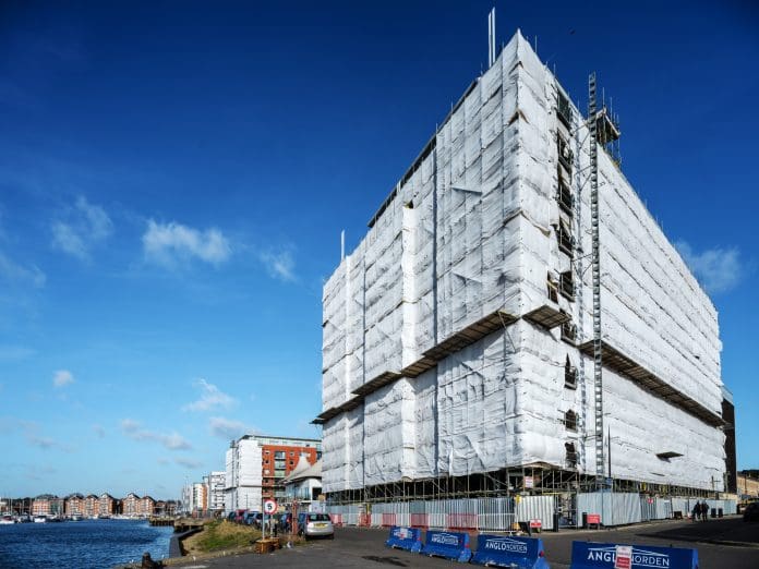 Cladding replacement scaffolding Patterson road, Ipswich, suffolk, England - Jan 30 2023: Orwell Quay remedial works to replace fire risk insulation