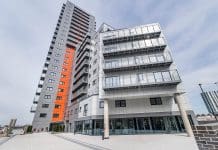 Mast Quays tower block given second chance with design changes The Mast Quays tower block, including the orange cladding that will need replacing