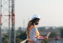 How to choose the right limit of indemnity for your cyber insurance policy Engineer working on a building site The telephone and internet network signal systems of the construction building are being inspected representing the appropriate limit of indemnity for your business' cyber insurance policy