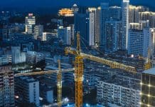 China’s Leadership in Construction: Lessons for the UK and the Future of Structural Warranty Insurance Tower crane, construction site, city center, representing China's construction industry