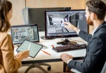 Data is the driving force for future sustainability Two creative office employees making interior design on the computer and digital tablet at the modern office of architectural firm. Concept of 3d modelling and digital Interior designing, representing sustainability data