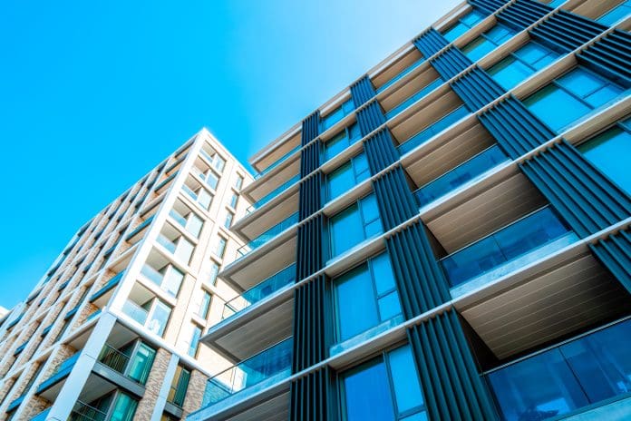 Riverside apartment blocks at Battersea Reach in London Looking up at high rise buildings. Fire safety
