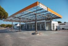 The grey belt: A golden opportunity? A disused petrol station with a decaying canopy representing grey belt land