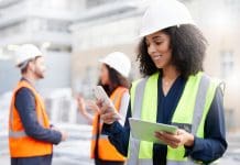 The Information Management Initiative: Why you should sign up Engineering, phone and a woman outdoor for planning, search or communication. African engineer person with technology in a city for construction site, project management or app for maintenance team