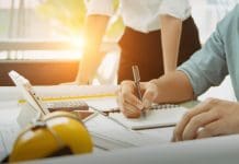 Strategic marketing in construction: Why the right plan matters more than ever Engineer meeting in modern office with Architecture Interior Designer. Discussion to architectural project and Construction. Progress of Figures denoting of Accounting and Financial with partner, representing strategic marketing