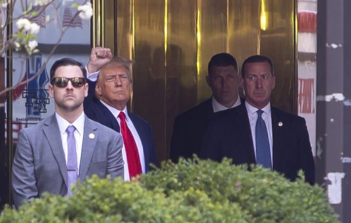 President Trump, picutred here at one of his arraignments in 2023, today announced a range of tariffs, including 10% import tax on British goods entering the US, on what he called 'Liberation Day'