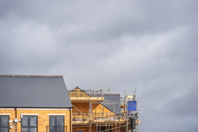 Construction aparments building site in england uk. Construction aparments building site in england uk, representing poor payment practices in construction