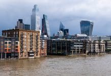 Flood maps reveal higher risk to commercial properties Dockside development beside the River Thames, in the financial heart of the City of London. The modern riverside development is made up of residential apartments, hotels, restaurants and office space, making it a popular area in the heart of the financial district. Tall office buildings can be seen in the background, rising above the city landscape, well known recognisable landmarks in the English capital, representing flood risk