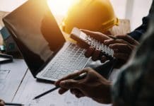 Reform and innovation critical as late payments cripple the construction industry Construction and structure concept of Engineer or architect meeting for project working with partner and engineering tools on model building and blueprint in working site, contract for both companies.