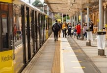 Chancellor announces £15.6bn for regional transport investment Manchester, United Kingdom - 2 August, 2020 : Light rail Metrolink tram in the city center of Manchester, UK, one of the areas that will benefit under the proposed regional transport investment funding