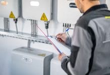 Smart Buildings Group relaunched as UK is poised to lead smart energy manufacturing market Engineer examining electric smart grid system