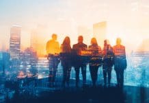 Partnership with Google Cloud: How strategic alliances will accelerate innovation in the AEC/O industry A talented business team stands confidently before a vibrant city skyline, symbolizing innovation, collaboration, and the endless future possibilities they strive for in their pursuit of success, representing the relationship between Nemetschek Group and Google Cloud