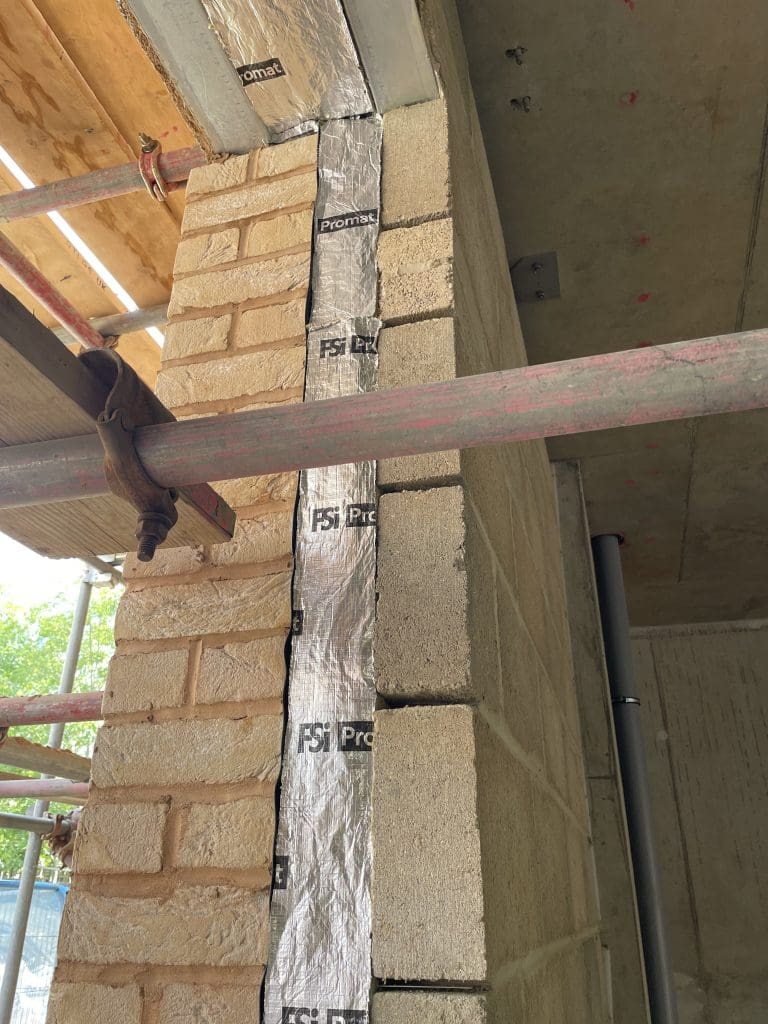 It is important to remember that passive fire protection is essential in non-combustible cavity walls for multi-occupancy buildings