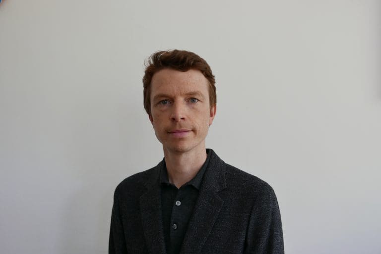 Headshot of Tom Wilcock