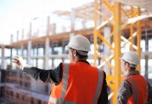 Industrial Strategy: The government must create a level playing field for SMEs Construction workers working on construction site, representing Industrial Strategy construction SMEs