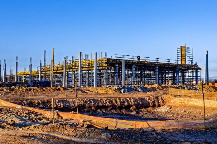 Construction of large building for shopping mall on the outskirts of Oudtshoorn, Western Cape, South Africa