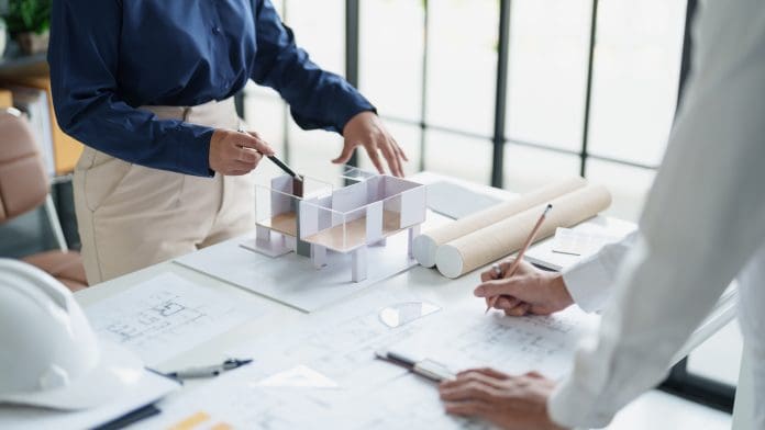 Architecture drawing on architectural Creative project business architecture building construction Industrial engineering Achievement Planning Design on blueprint eco, representing workplace wellbeing