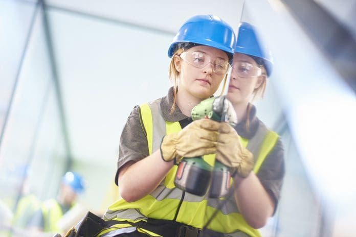 young female construction worker City & Guilds has found that 54% of business leaders doubt that the construction sector can meet housing targets without more skilled workers