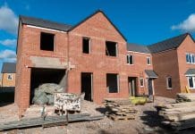 Seven house builders offer £100m to CMA to drop probe House construction empty shell ready for lining and windows representing CMA probe