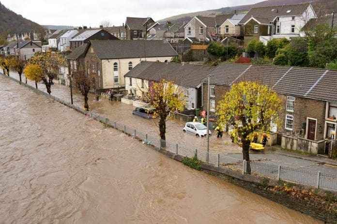 Pontypridd, Wales, UK - 24 November 2024: Flooding in a street near the town centre after the River Taff burst its banks following heavy rain from Storm Bert