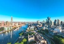 Government must fully grasp the construction challenge and move faster to support IS-8 Aerial view of finance district in London, representing IS-8